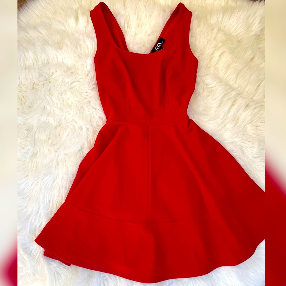 Lady in red!! Size L— flirty fit and flare mini dress.